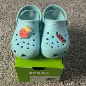 CROCS Light Blue Clogs with Sporty Charms